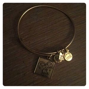 Alex and Ani “All for One” bangle in gold